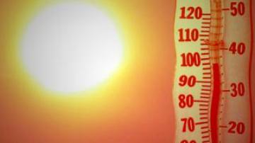 Sun and thermometer - high heat